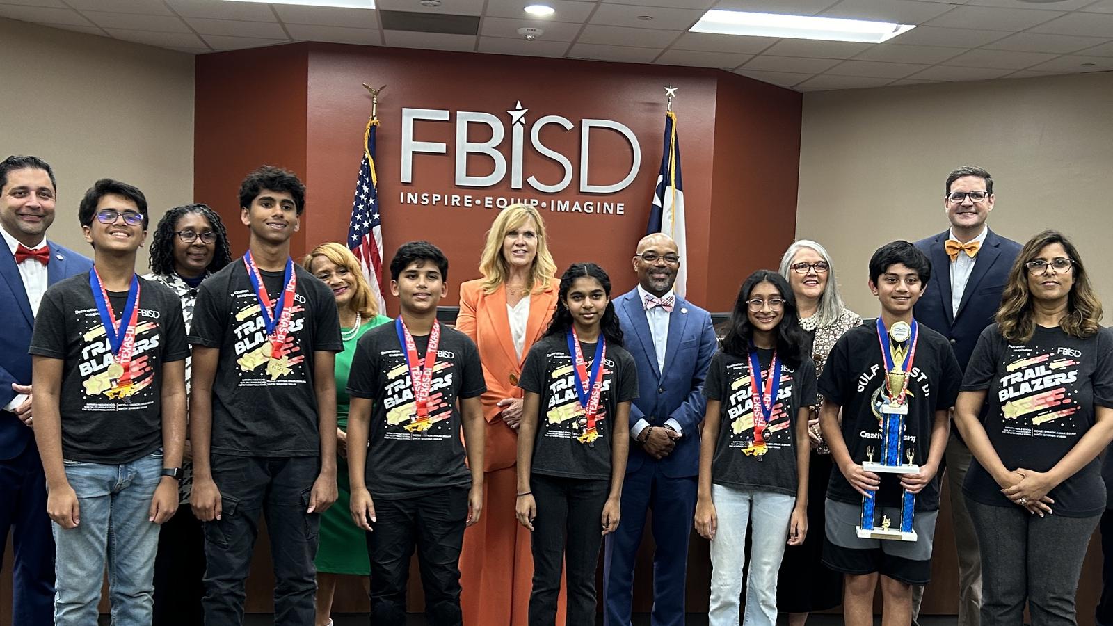 Team recognized by FBISD Board with trophy